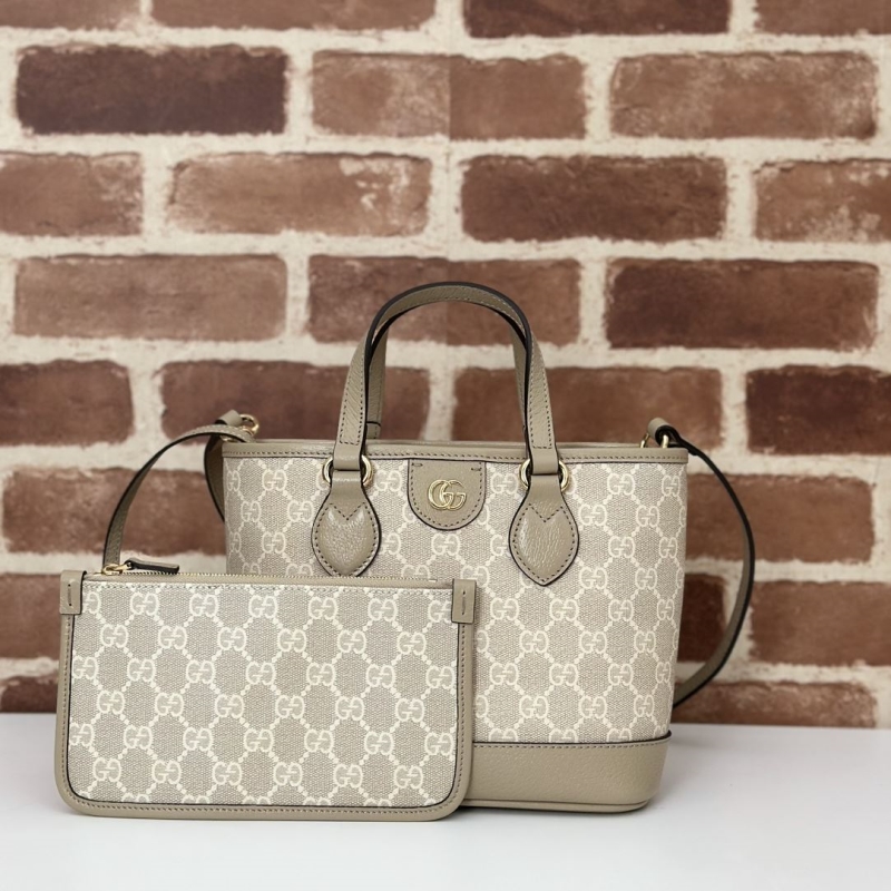 G*u*i shopping bags